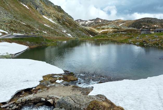 Spring alps mountain lake Lago della Piazza (Switzerland, Passo del San Gottardo)