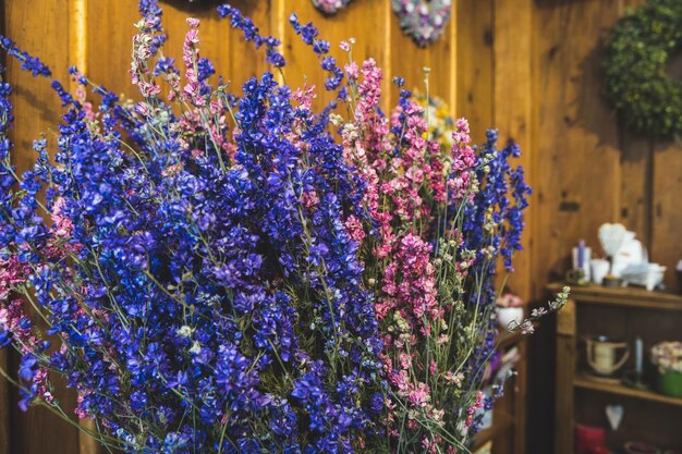 Spring bouquet of dried flowers of purple and pink flowers in the store decorations and colors