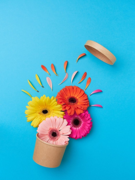 spring bursts with an explosion flowers on blue background