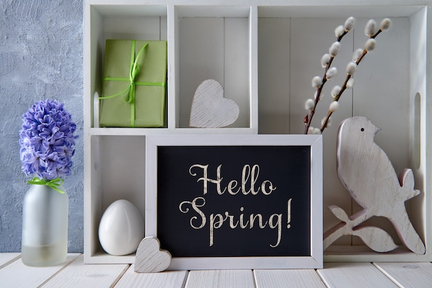 spring decorations, pussy-willow, hyacinth and blackboard