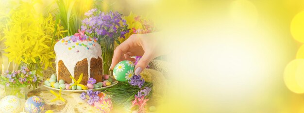 Spring flower banner background with Easter eggs Easter holiday creative background View with copy space