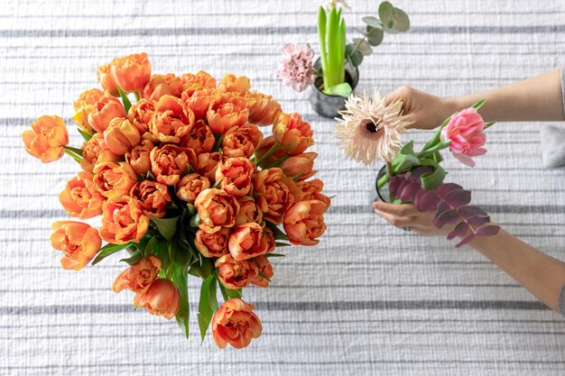 Spring flowers on the table serving and decoration concept top view