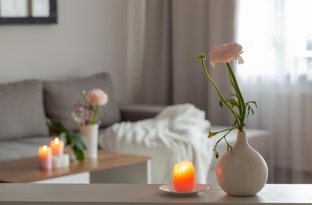 spring flowers in vase in white modern interior