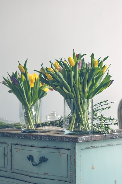 Spring flowers on a wooden table