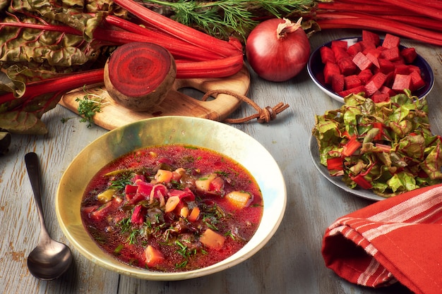 Spring food : vegetable soup with beet root and fresh leaves