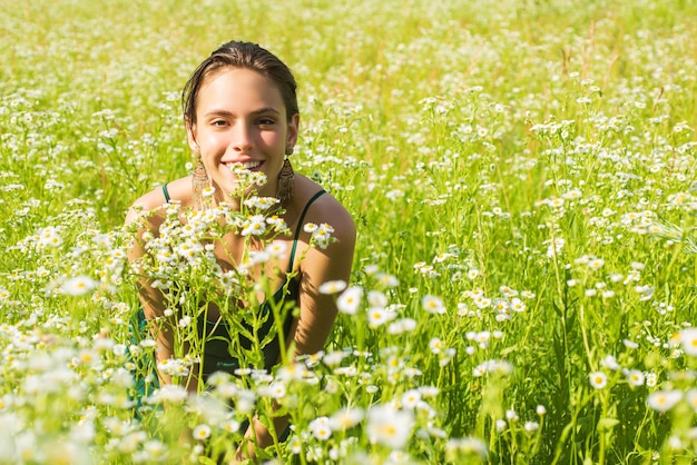 Spring girl outdoor in summer field healthy breathing concept unity with nature