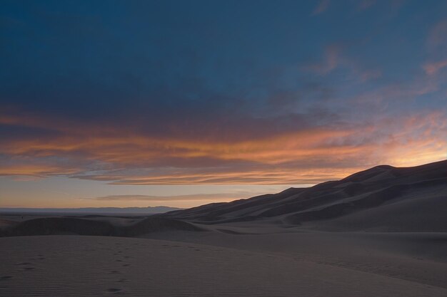 Spring at Great Sand Dunes National Park, Colorado. Medano Creek flows around the base of the dunes in springtime.