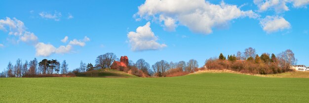 Spring panorama banner in Binz on Ruegen, Northern Germany with ancient church, panoramic banner.