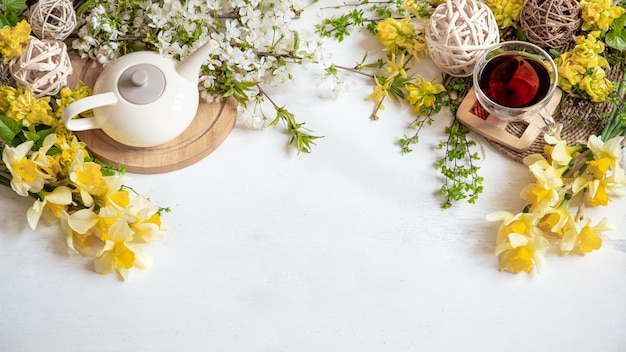 Spring table Composition with spring flowers. The concept of comfort and spring.