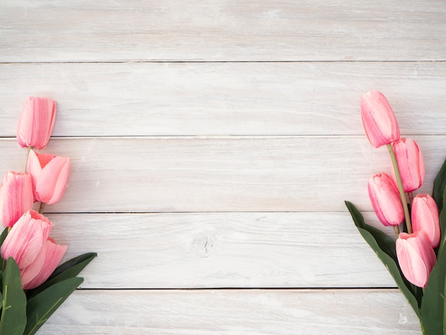 Spring tulips flowers on a old wooden