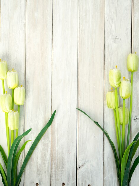 Spring tulips flowers on a old wooden