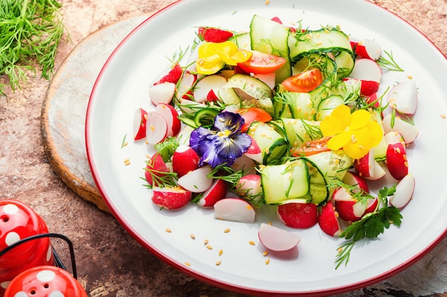 Spring vegetable salad with flowers