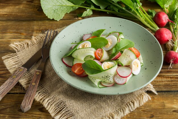 Spring vitamin salad with fresh vegetables