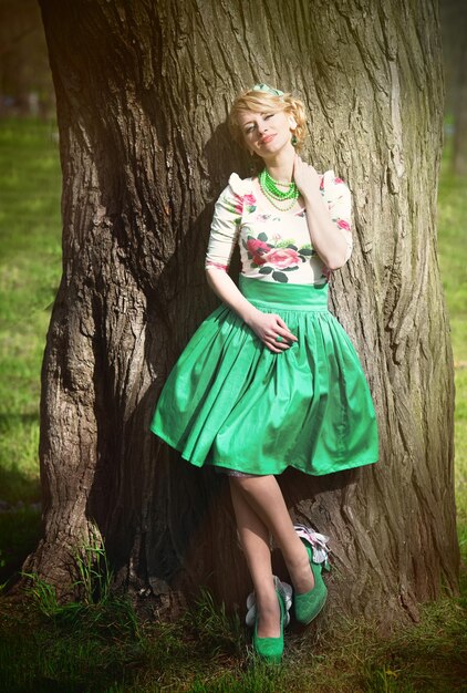 Spring walk Romantic portrait of a girl under a tree