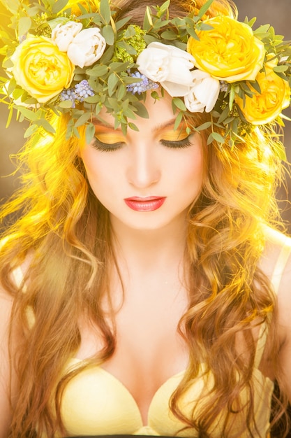 Spring woman's vertical portrait in studio