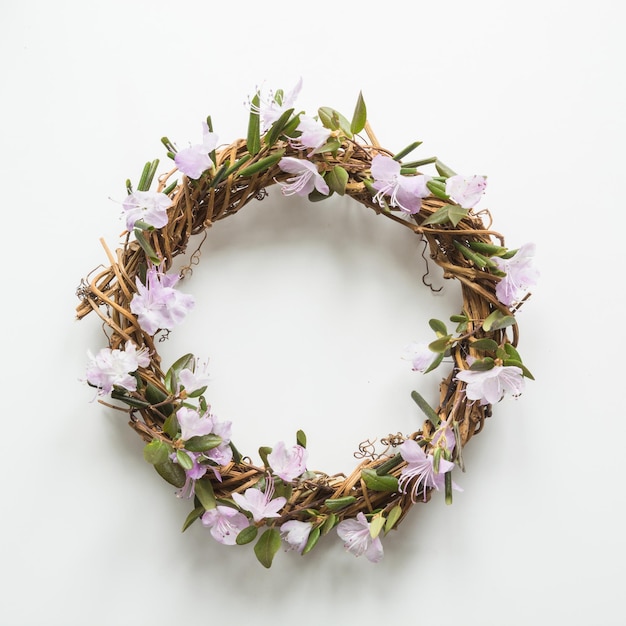 Spring wreath with flowers Creative flat lay View from above