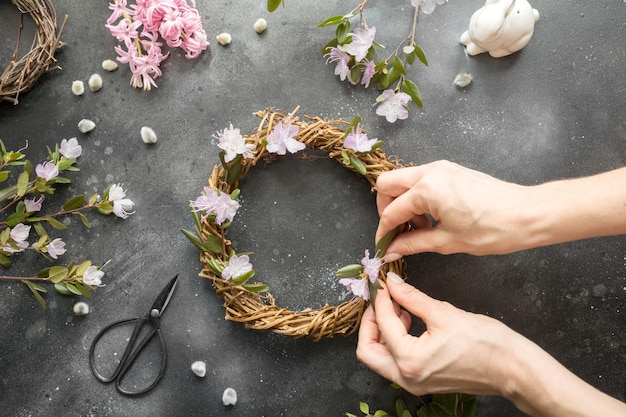 Spring wreath with flowers Creative flat lay View from above