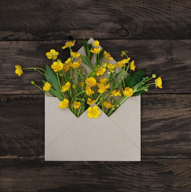 Spring yellow little flowers in envelope. 