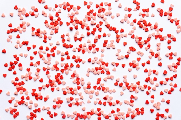 sprinkles background sugar sprinkle red hearts decoration for cake and bakery Top view flat lay Valentines holiday