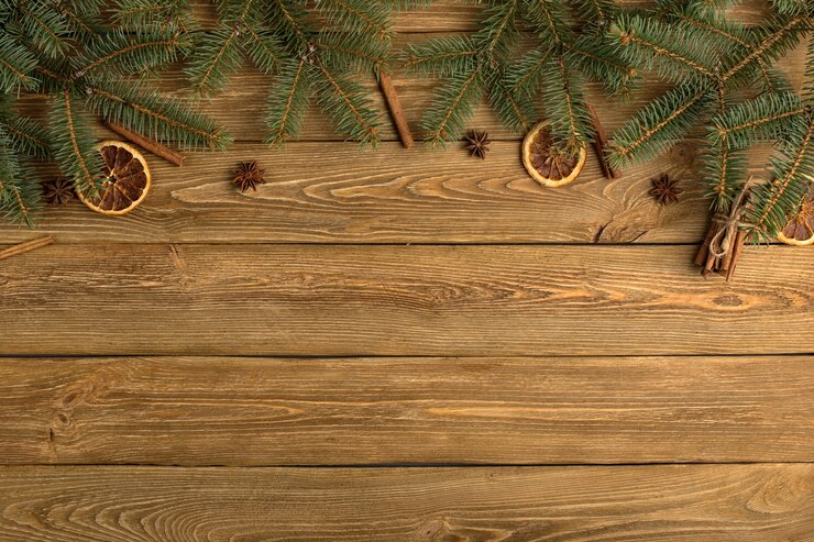 Photo spruce branches and ornaments on the table