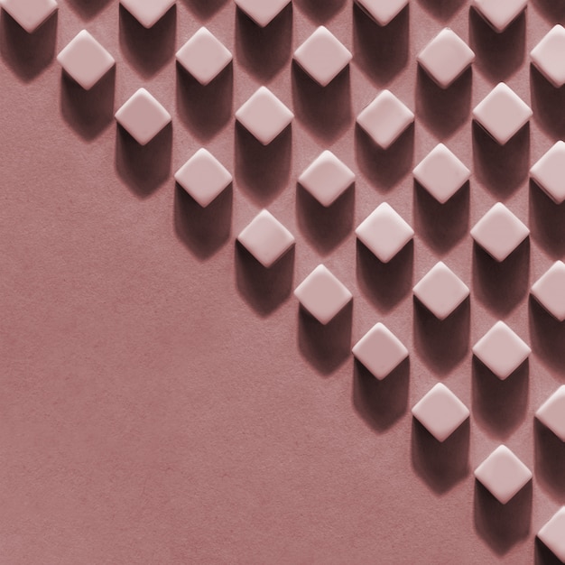 ピンクのキューブと正方形の抽象的な背景