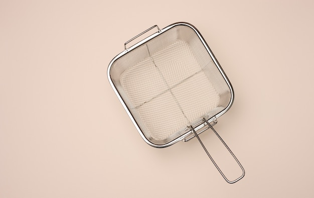 Square basket sieve for frying in oil, top view