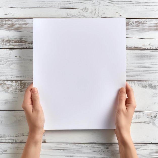 Square Blank Paper in Hands on White Wooden Table