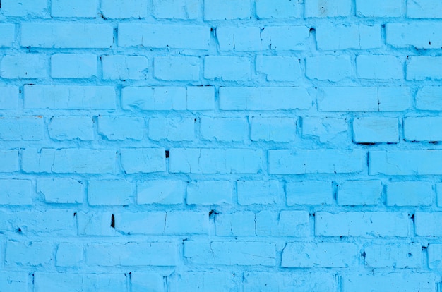 正方形のレンガブロック壁の背景色と質感。ブルー塗装