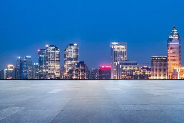 Square brick floor and Shanghai cityscape