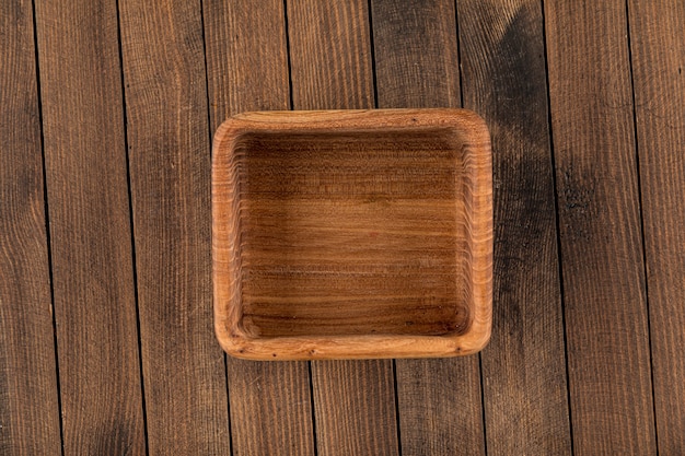 Square brown empty natural wooden bowl