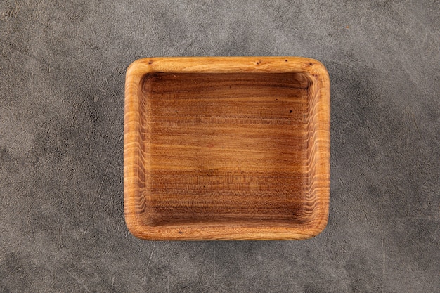 Square brown empty natural wooden bowl