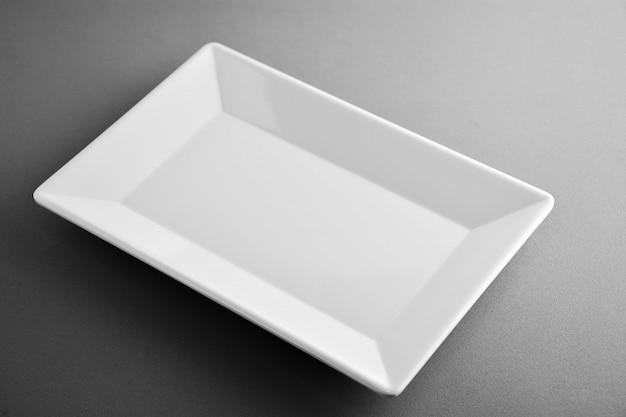 Square plate on grey background