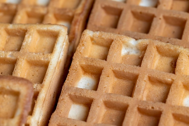 Square sweet soft waffles on the table