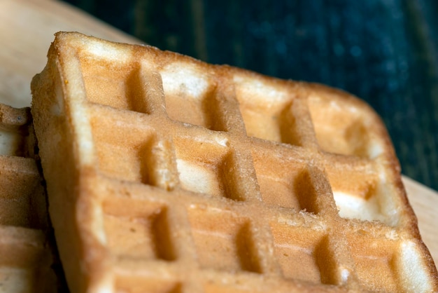 Square sweet soft waffles on the table