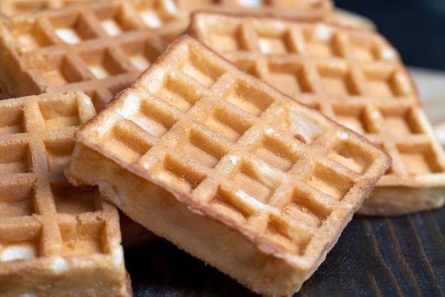 Square sweet soft waffles on the table