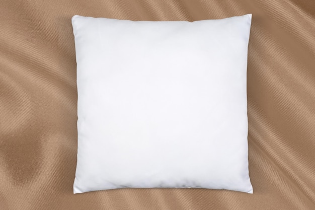 Square Throw Pillow Mockup on Golden Silk