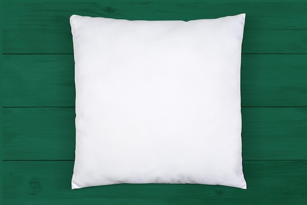 Photo square throw pillow mockup on green wood background