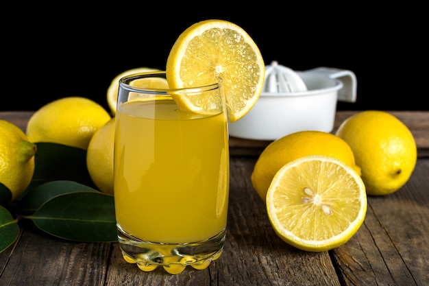 Squeezing lemon juice with hand juicer