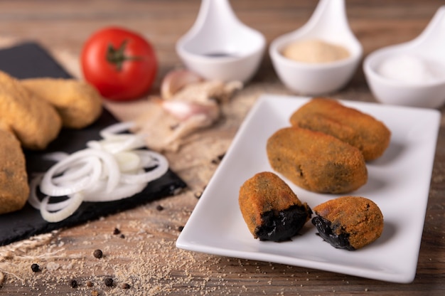 squid croquettes in their ink