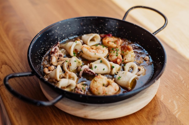 Squid and garlic prawns portion in a tapas bar