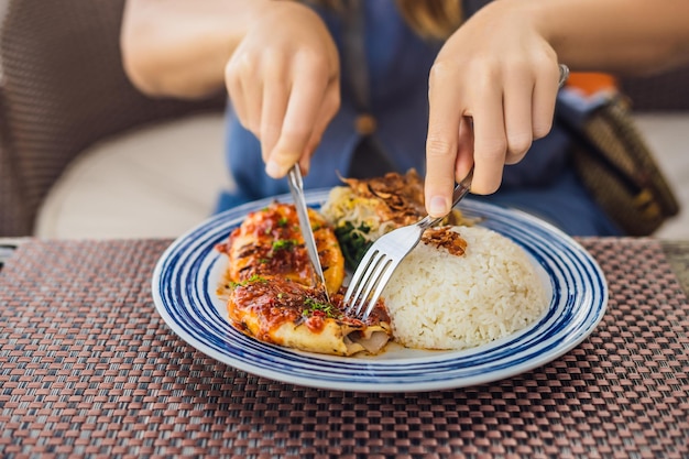 Squid grill with rice. Balinese cuisine Indonesia.