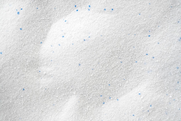 テクスチャまたは背景の上面図としてのゴツゴツした白い粉末洗剤