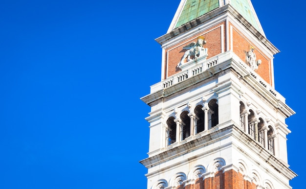 St Mark Campanile on blue sky with copyspace