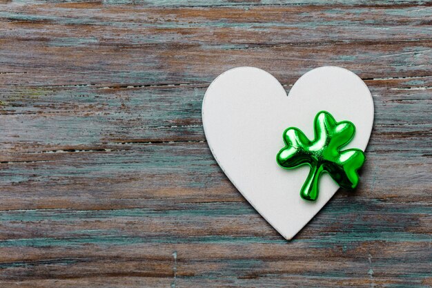 St Patrick's Day background with clover leaf and heart