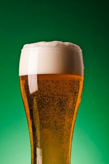 st patrick's day beer against a green background