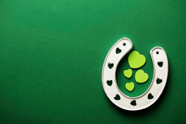 St Patrick's Day green background with lucky horseshoe