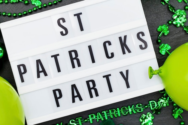 St Patrick's day party lightbox message with green decorations