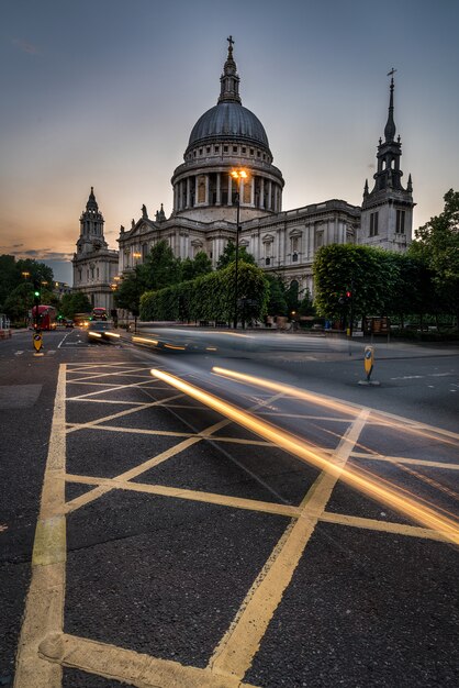 St Paul's cathedral with trails from cars and buses in London