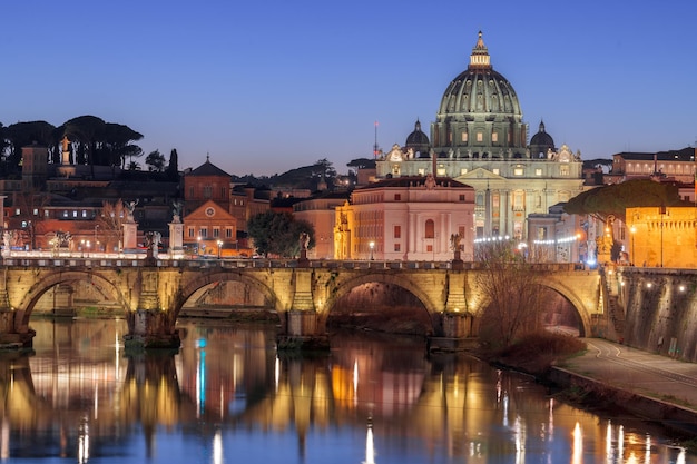 St peter's basilica in vatican city on the tiber river through rome italy