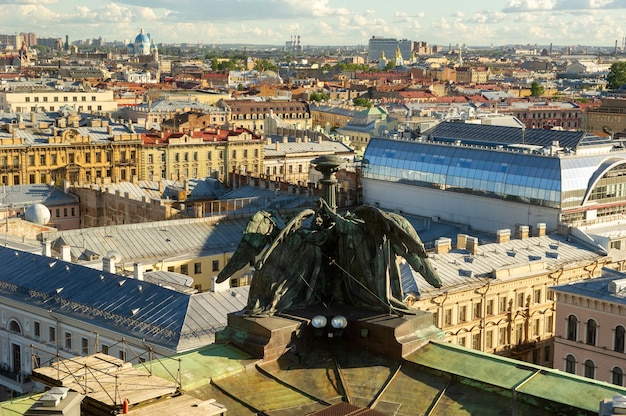 The St. Petersburg arial panorama with old historical streets and buildings is visible from the top